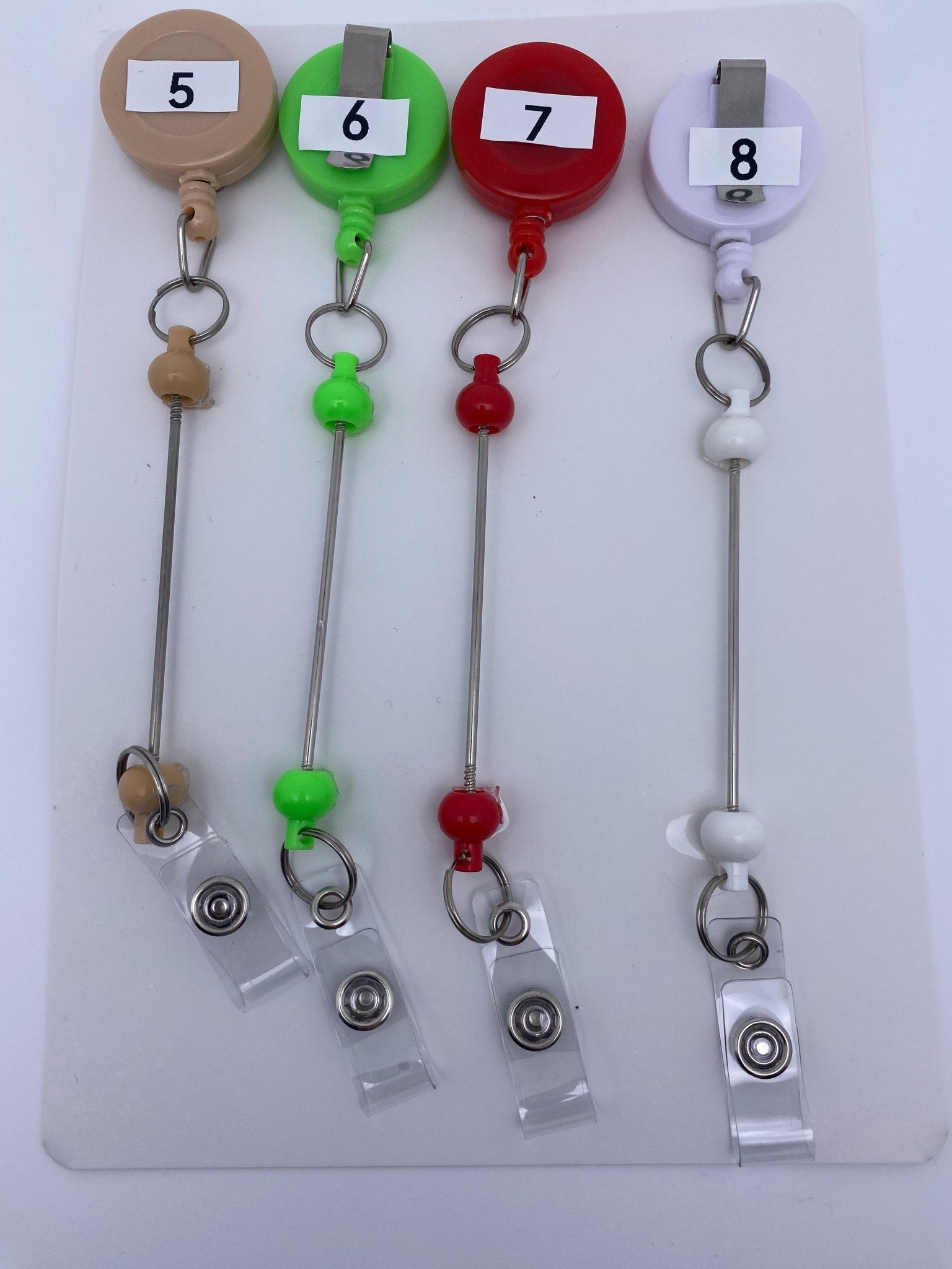 152. Badge reels - Romo bead