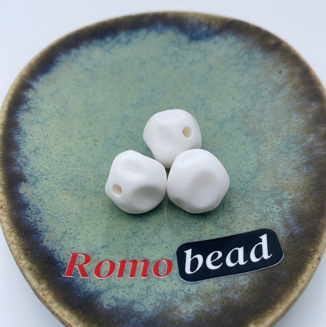 28. - Romo bead