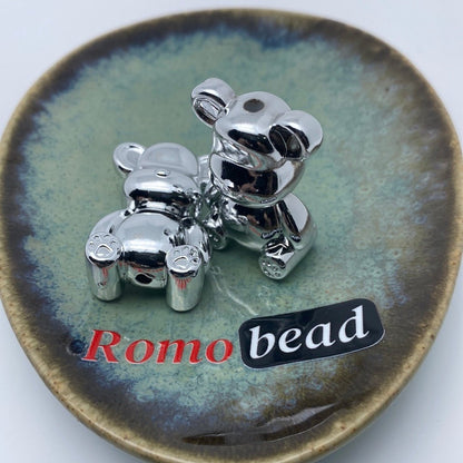 34. Shiny,silver, gold bear beads - Romo bead