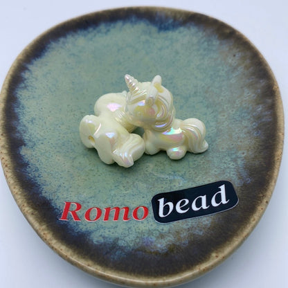 63. unicorn uv beads - Romo bead