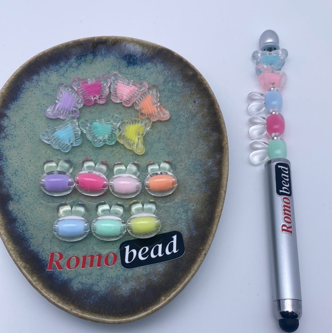 74. butterfly and rabbit head clear beads - Romo bead