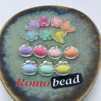 74. butterfly and rabbit head clear beads - Romo bead