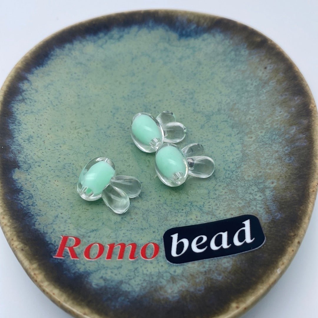 74. butterfly and rabbit head clear beads - Romo bead