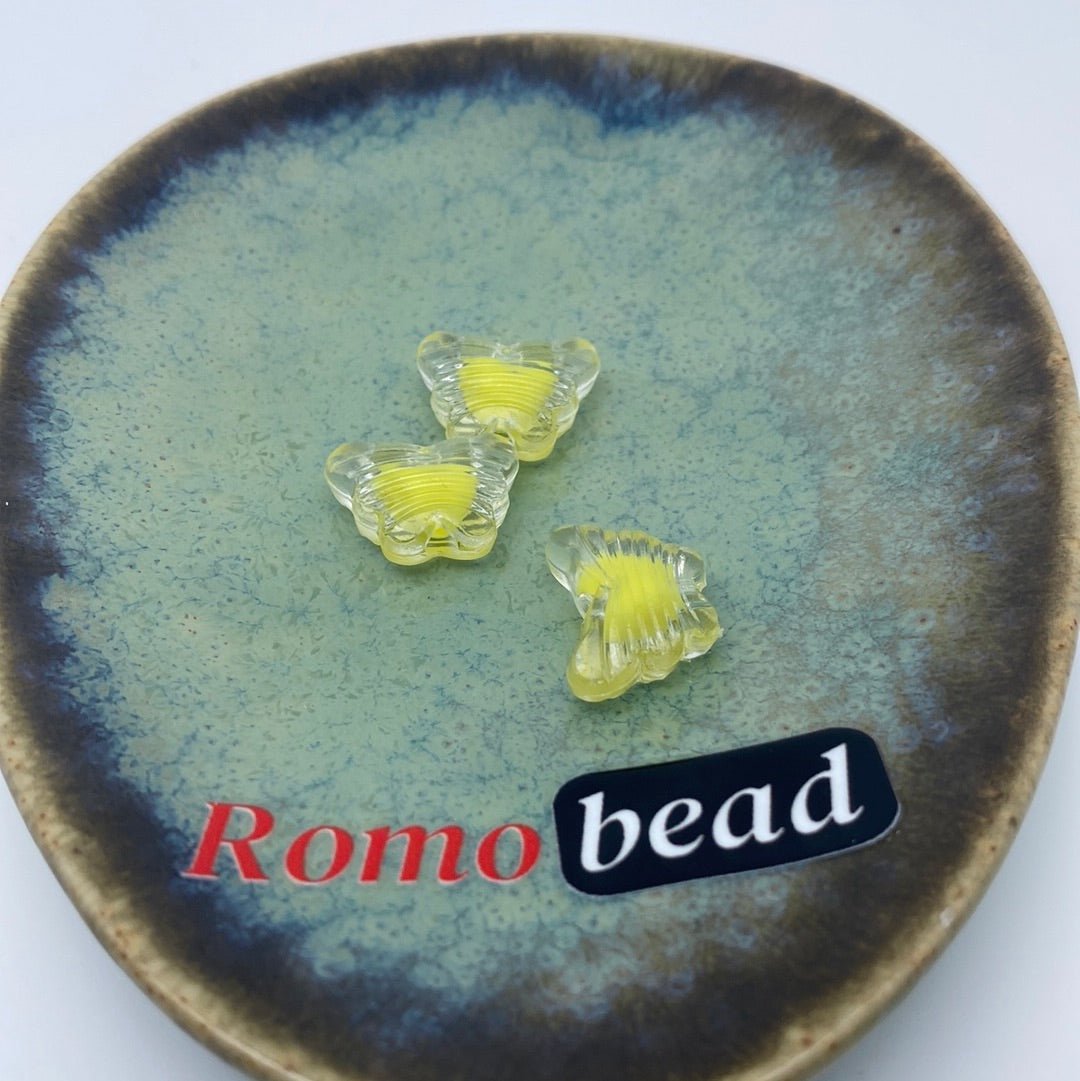 74. butterfly and rabbit head clear beads - Romo bead