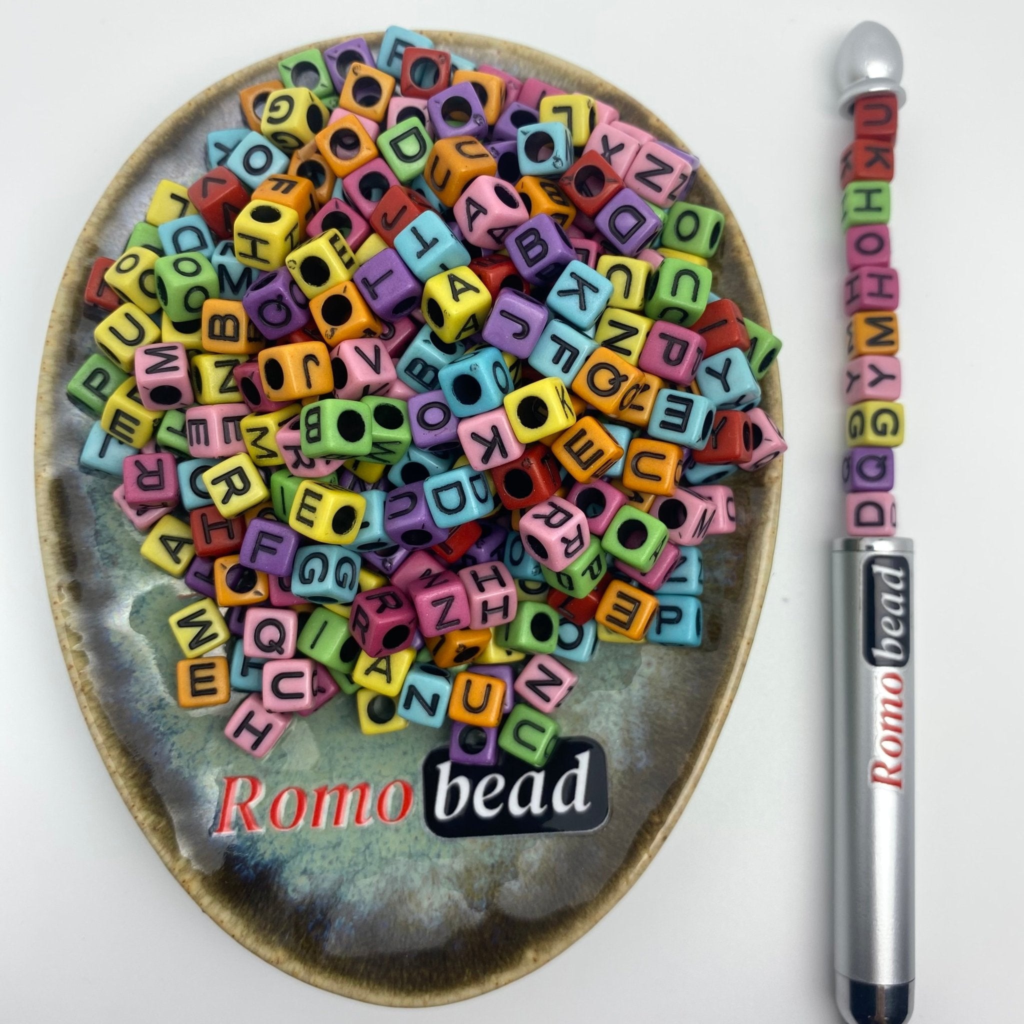 85. cube letter - Romo bead