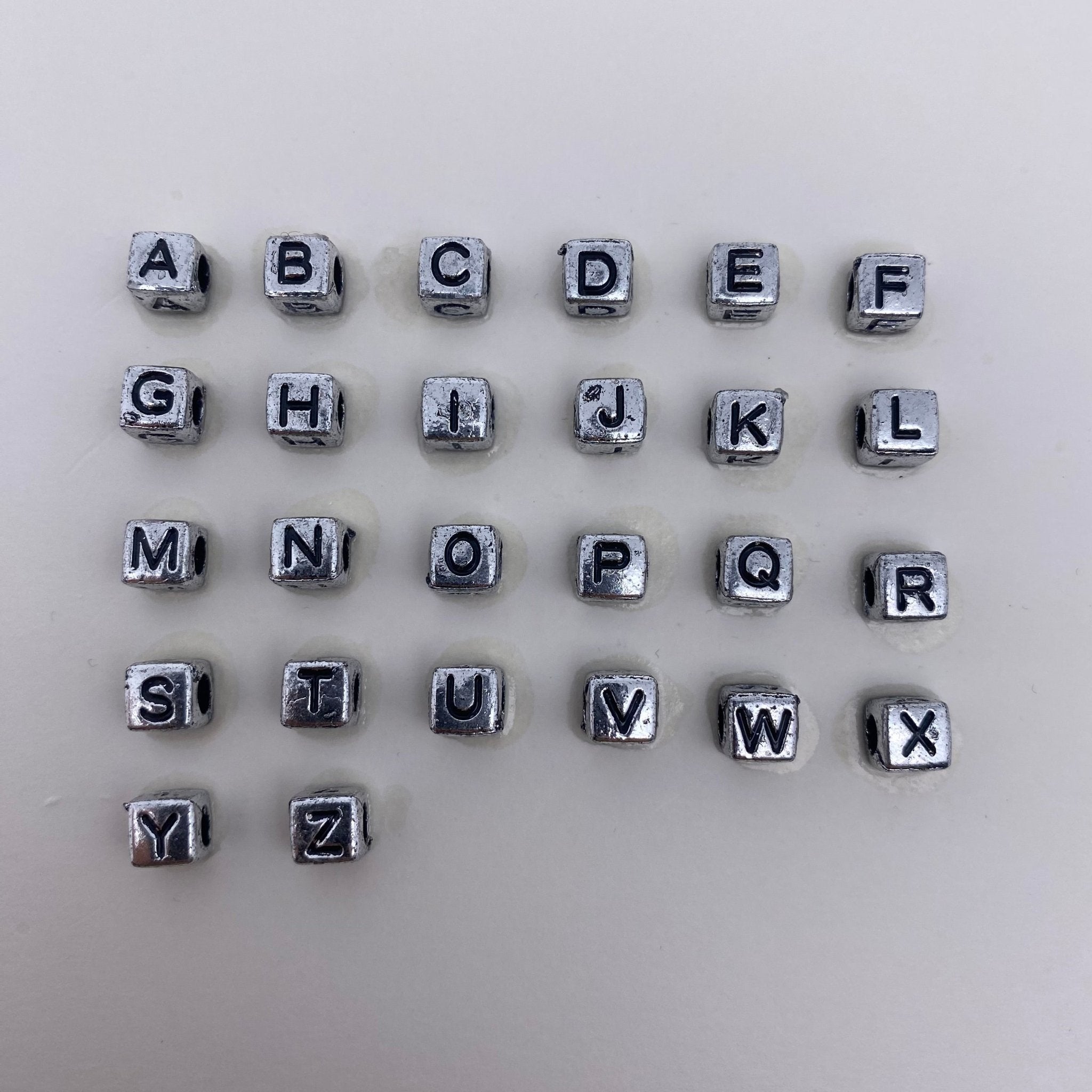 88. cube silver letter beads - Romo bead