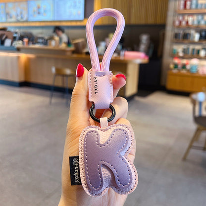 Creative PU leather 26 English letter keychain pendant simple couple car bag keychain pendant gift