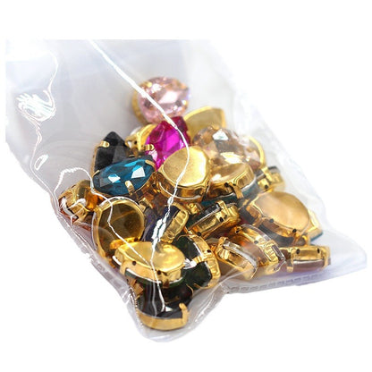 Direct supply of gold-backed waterdrop glass claw rhinestones, bridal dresses, apparel, crystal jewelry, accessories, and multi-color waterdrop claw rhinestones