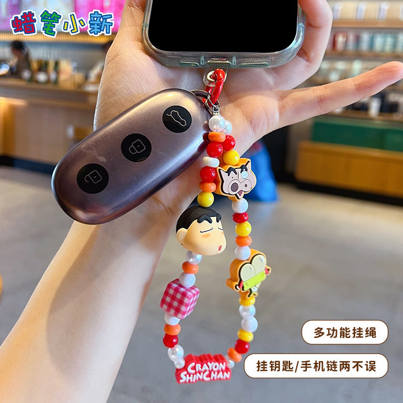 Genuine crayon Shin-chan beaded mobile phone chain small pendant couple car key chain bag doll doll ornament