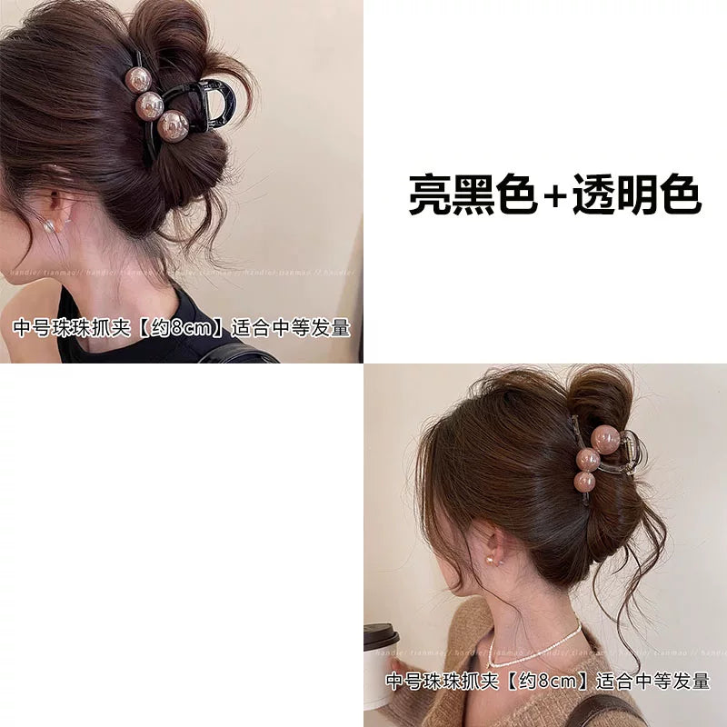 Elegant pearl grab clip for women, high-end 2026 new style shark clip at the back of the head, medium size coil hair clip, small hair volume