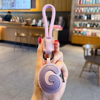 Creative PU leather 26 English letter keychain pendant simple couple car bag keychain pendant gift