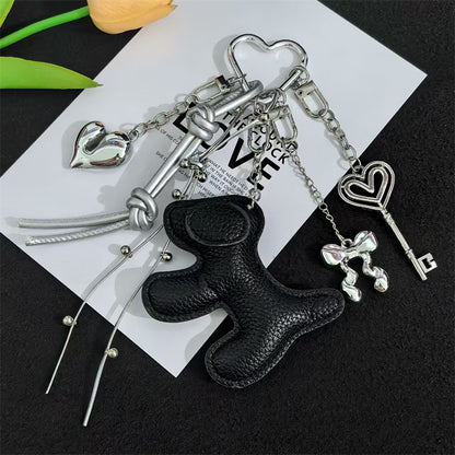 Cross-border explosive cartoon leather puppy bag hanging mobile phone case keychain creative lanyard PU leather couple DIY accessories