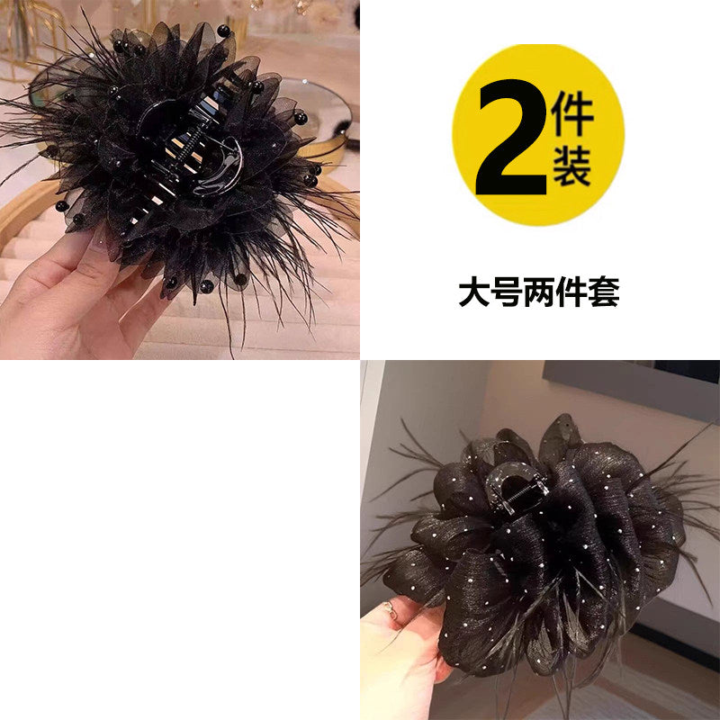 Temperament: Korean gypsophila hairpin women's high-end new feather grip clip, high-end back of the head, updo shark clip