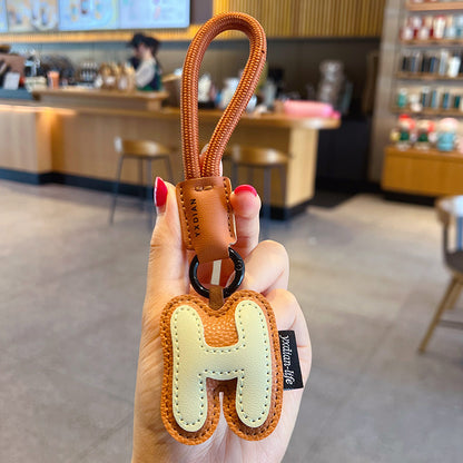 Creative PU leather 26 English letter keychain pendant simple couple car bag keychain pendant gift