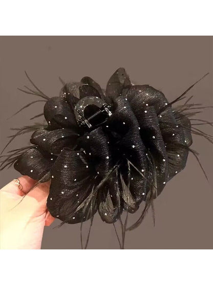 Temperament: Korean gypsophila hairpin women's high-end new feather grip clip, high-end back of the head, updo shark clip