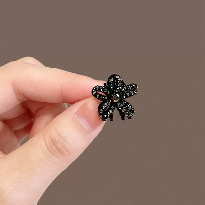 High-end black metallic star-shaped hairpins for women, new bangs side clip, princess hairstyle, small claw pin, rhinestone hairpin