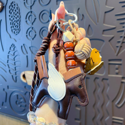 Creative handmade DIY leather small Pegasus keychain accessories women's miu bag pendant couple keychain pendant