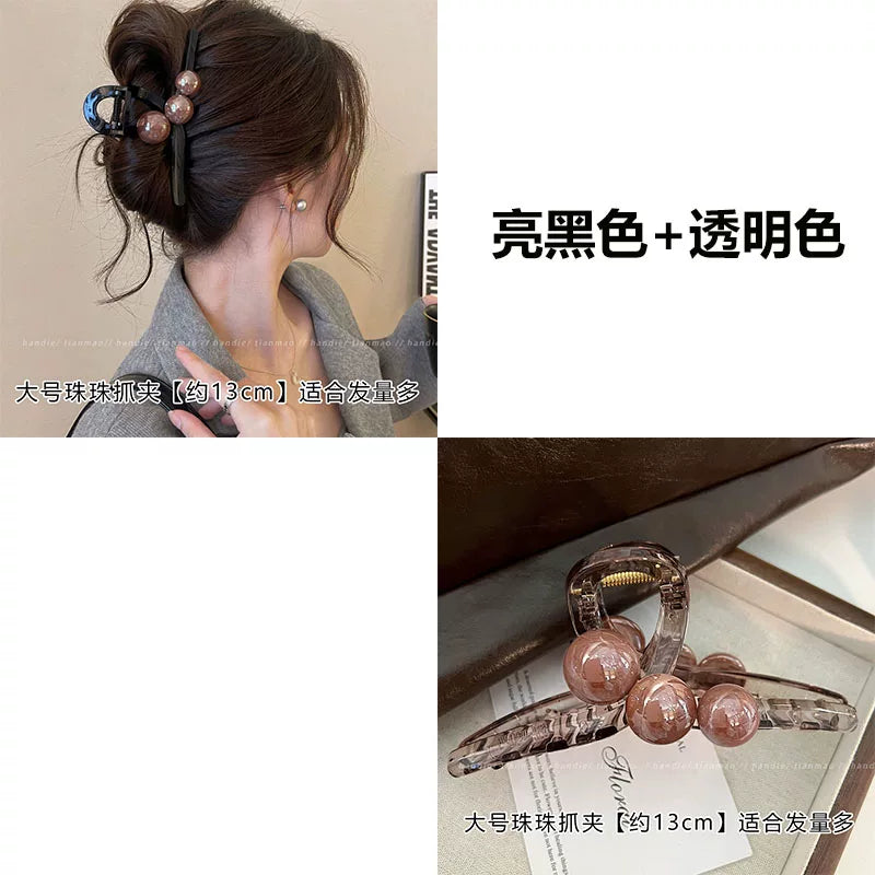 Elegant pearl grab clip for women, high-end 2026 new style shark clip at the back of the head, medium size coil hair clip, small hair volume