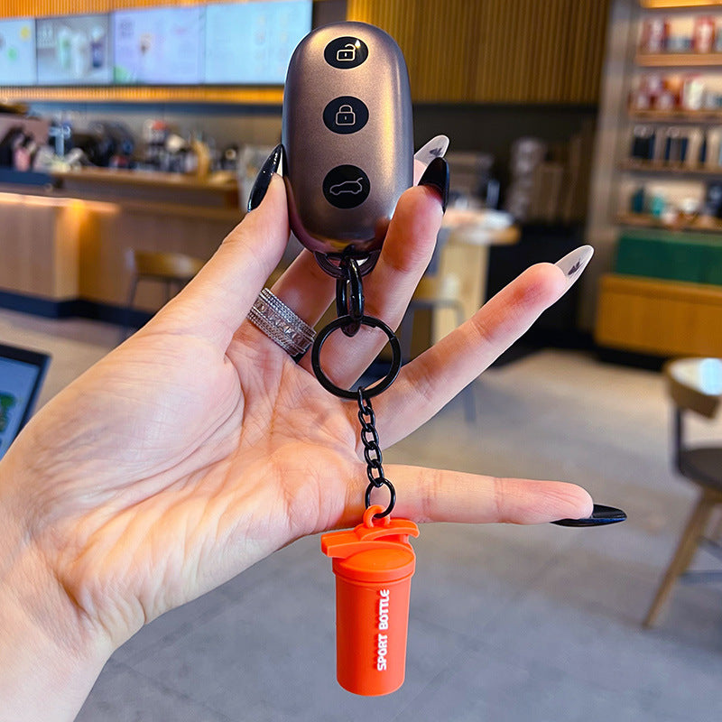 Creative sports fitness mini water bottle key chain school bag small pendant car key chain bag pendant small gift