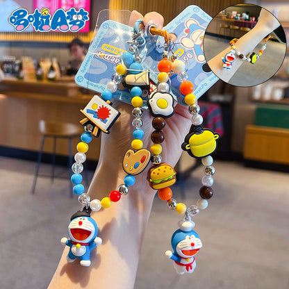 Genuine Doraemon beaded dopamine mobile phone chain pendant cute bag doll keychain charm accessories