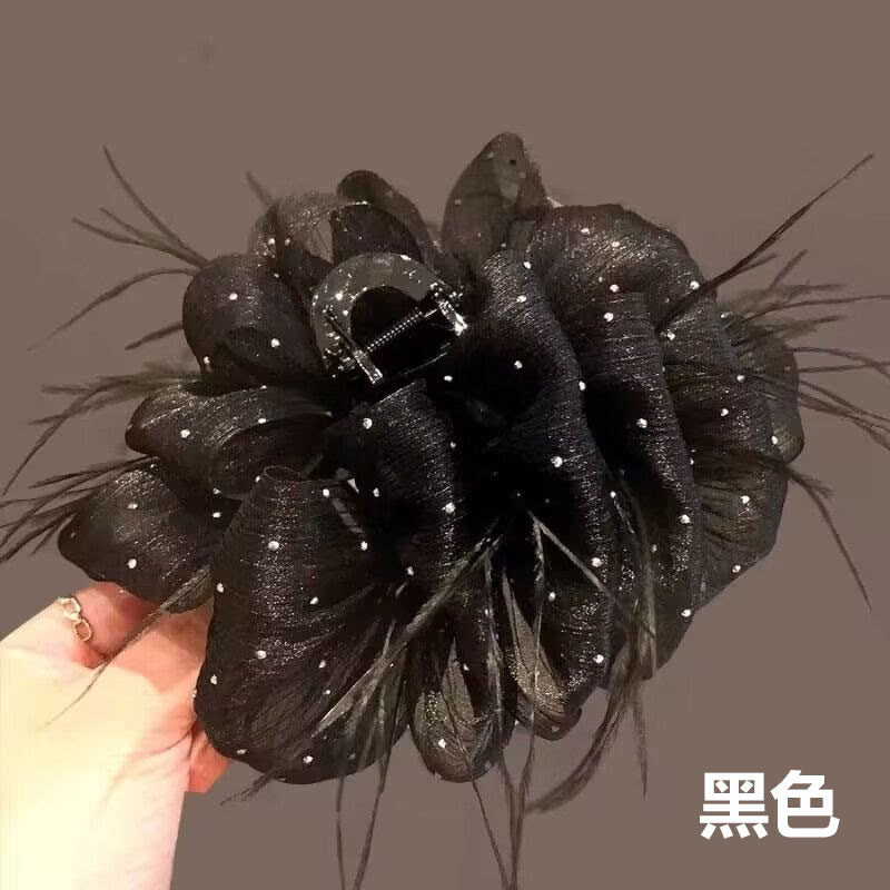 Temperament: Korean gypsophila hairpin women's high-end new feather grip clip, high-end back of the head, updo shark clip