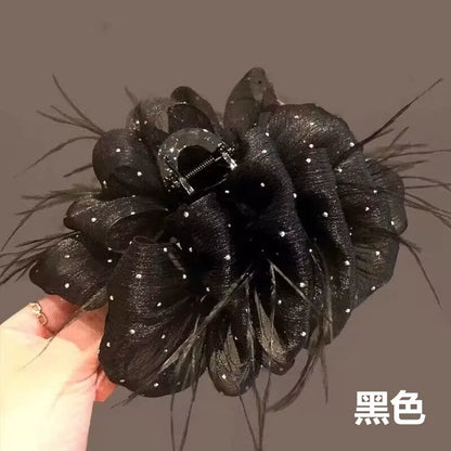 Temperament: Korean gypsophila hairpin women's high-end new feather grip clip, high-end back of the head, updo shark clip