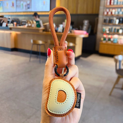 Creative PU leather 26 English letter keychain pendant simple couple car bag keychain pendant gift