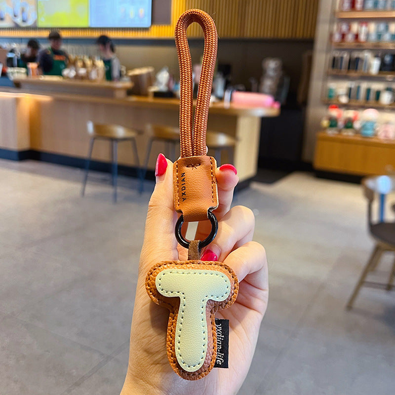 Creative PU leather 26 English letter keychain pendant simple couple car bag keychain pendant gift