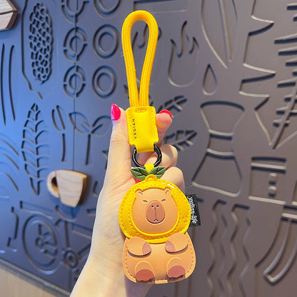 Creative PU leather capybara keychain doll pendant cute car key chain school bag pendant small gift