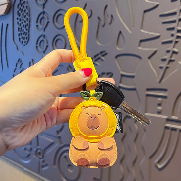 Creative PU leather capybara keychain doll pendant cute car key chain school bag pendant small gift