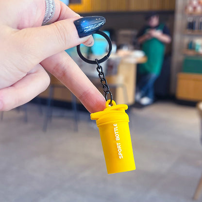 Creative sports fitness mini water bottle key chain school bag small pendant car key chain bag pendant small gift
