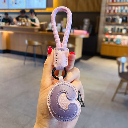 Creative PU leather 26 English letter keychain pendant simple couple car bag keychain pendant gift