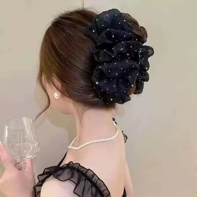 Temperament: Korean gypsophila hairpin women's high-end new feather grip clip, high-end back of the head, updo shark clip
