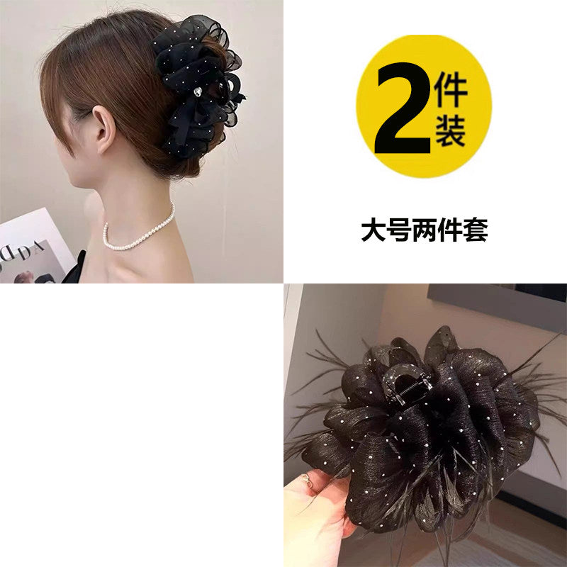 Temperament: Korean gypsophila hairpin women's high-end new feather grip clip, high-end back of the head, updo shark clip