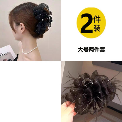 Temperament: Korean gypsophila hairpin women's high-end new feather grip clip, high-end back of the head, updo shark clip