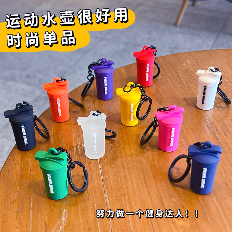 Creative sports fitness mini water bottle key chain school bag small pendant car key chain bag pendant small gift