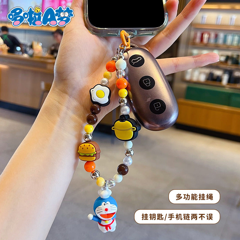 Genuine Doraemon beaded dopamine mobile phone chain pendant cute bag doll keychain charm accessories