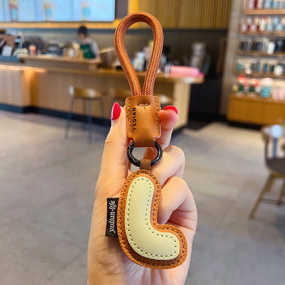 Creative PU leather 26 English letter keychain pendant simple couple car bag keychain pendant gift