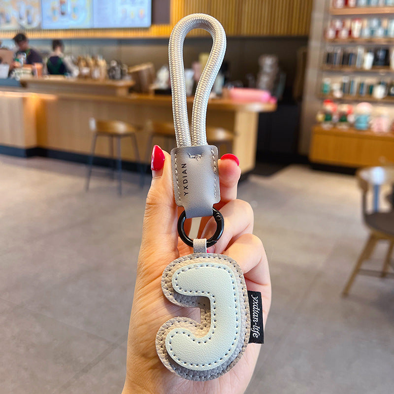 Creative PU leather 26 English letter keychain pendant simple couple car bag keychain pendant gift