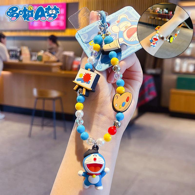 Genuine Doraemon beaded dopamine mobile phone chain pendant cute bag doll keychain charm accessories