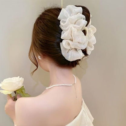 Temperament: Korean gypsophila hairpin women's high-end new feather grip clip, high-end back of the head, updo shark clip