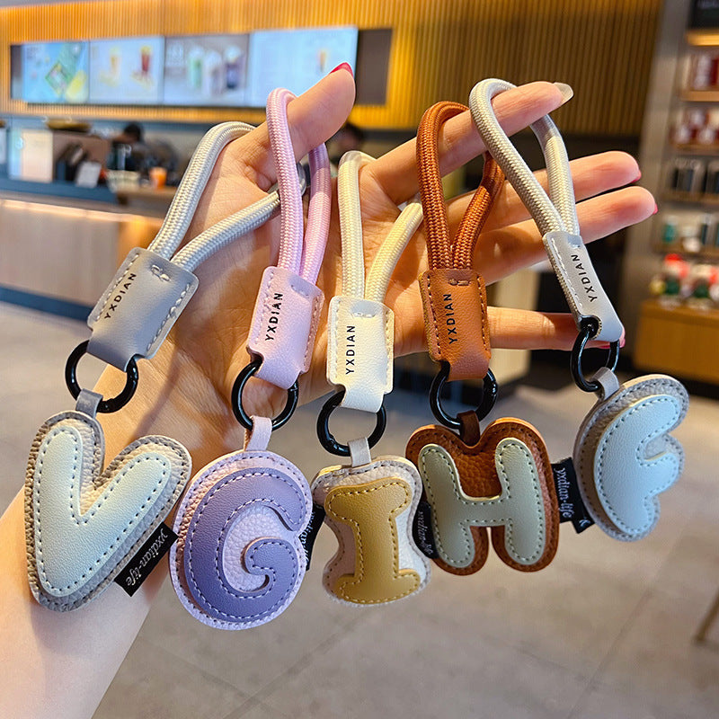Creative PU leather 26 English letter keychain pendant simple couple car bag keychain pendant gift