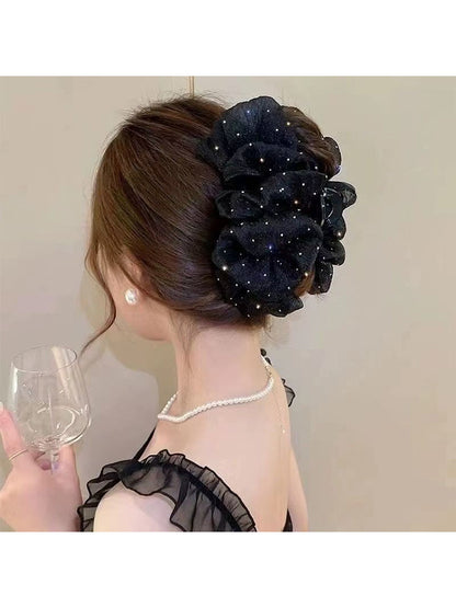 Temperament: Korean gypsophila hairpin women's high-end new feather grip clip, high-end back of the head, updo shark clip