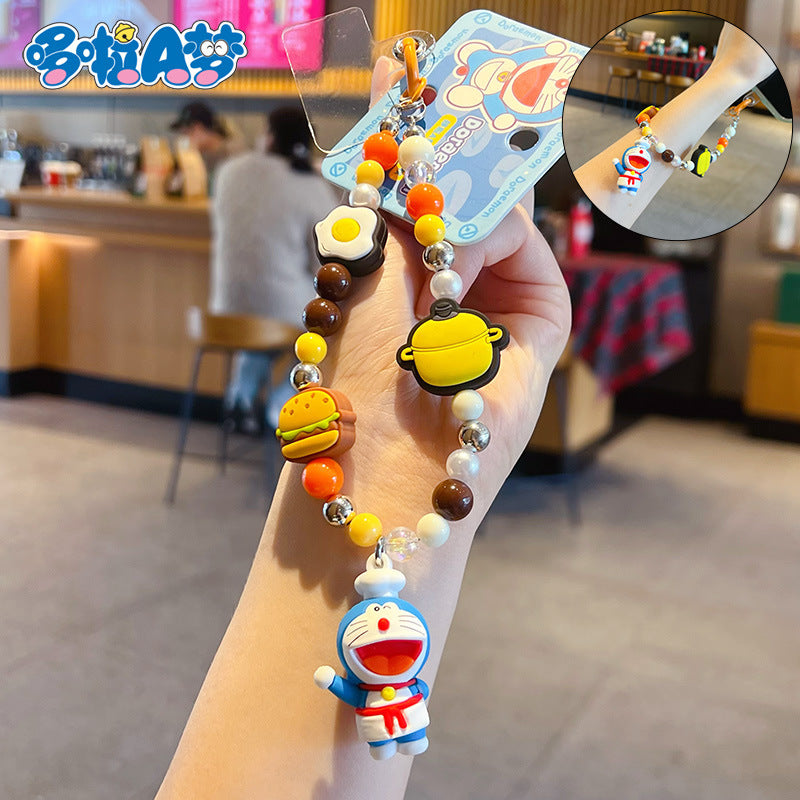 Genuine Doraemon beaded dopamine mobile phone chain pendant cute bag doll keychain charm accessories