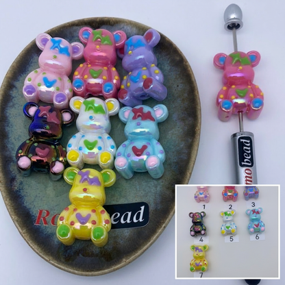 Composite image for shiny hand made UV print bear beads